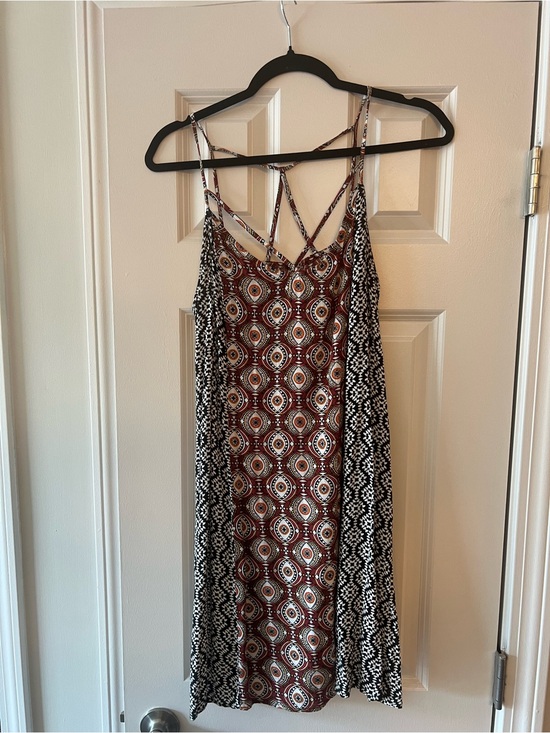 Xhilaration Dresses & Skirts - Xhilaration Mixed-Print Strappy Mini Dress in Rust and Black
